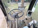 CAT M316C gumikerekes kotró eladó