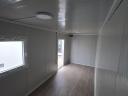 Eladó új konténer – 2,4 m x 6 m x 2,5 m – villanyszerelve,  PVC padlóval