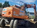 Eladó napi használatban lévő 2015-ös Doosan DX 160W-3 forgó kotró gumikerekes kivitelben