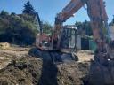 Eladó napi használatban lévő 2015-ös Doosan DX 160W-3 forgó kotró gumikerekes kivitelben