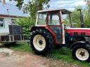Steyr 8055 homlokrakodóval és utánfutóval eladó