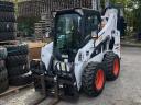 Eladó Bobcat S570 kompakt rakodó, raklapvillával és kiegészítőkkel