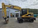 Caterpillar M312 gumikerekes forgókotró