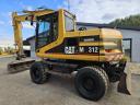 Caterpillar M312 gumikerekes forgókotró
