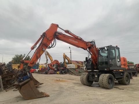Hitachi ZX145W-3+ SMP csipeszes Rototilt gumikerekes kotró Hitachi ZX145W-3+ SMP csipeszes Rototilt gumikerekes kotró