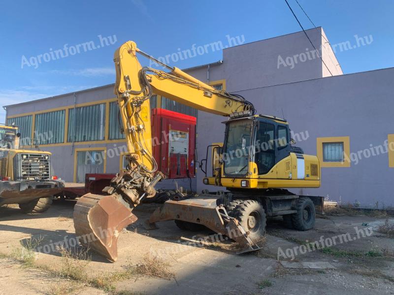 Komatsu PW180-E0+Engcon Rototilt gumikerekes kotró