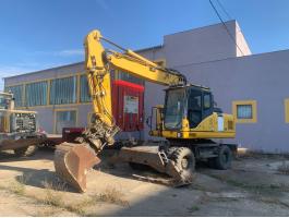 Komatsu PW180-E0+Engcon Rototilt gumikerekes kotró