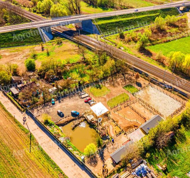 Eladó különleges GKSZ telek Pécelen saját halastóval és teljes infrastruktúrával