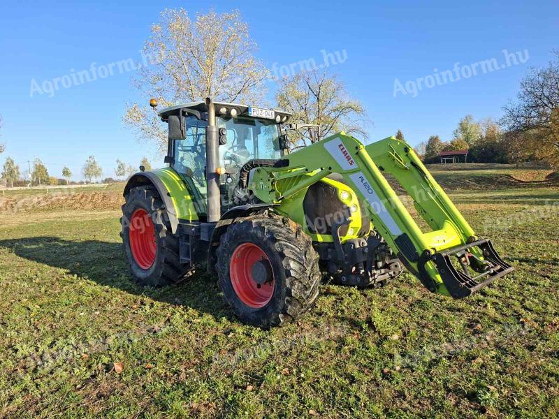 Claas Arion 640 Cebis FL 120 gyári homlokrakodóval