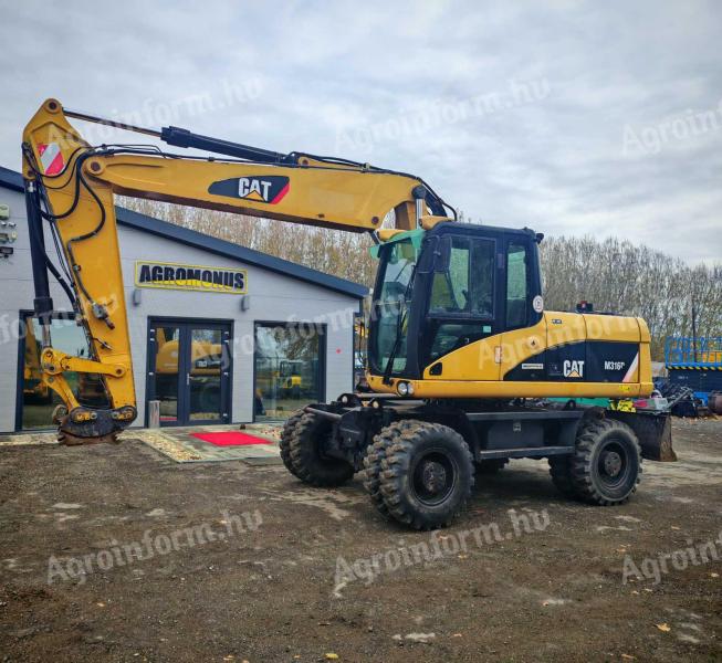 Caterpillar M316D gumikerekes forgókotró