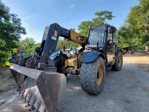 Teleszkópos rakodó Caterpillar 407C eladó Teleszkópos rakodó Caterpillar 407C eladó