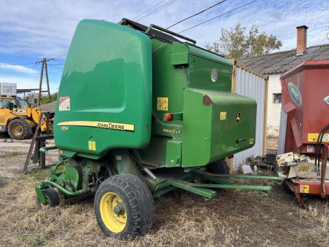 Sérült JD 854 Maxi Cut bálázó eladó