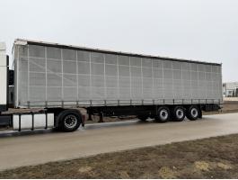 SCHMITZ S01 nyerges ponyvás rolós pótkocsi eladó