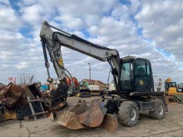 JCB JS145W+Engcon Rototilt EC219 gumikerekes kotró