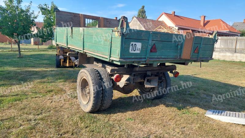 Eladó egytengelyes billenős pótkocsi magasítóval