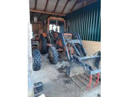 MTZ 552-E eladó Blackbull homlokrakodóval, 1992-es évjárat