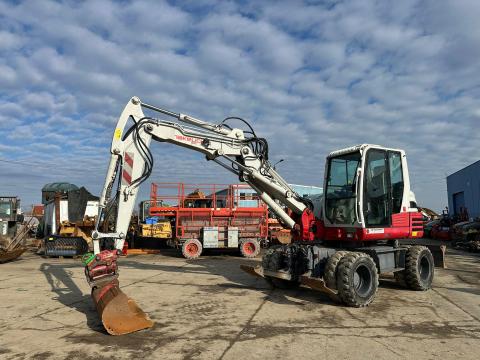 Takeuchi TB295W gumikerekes kotró