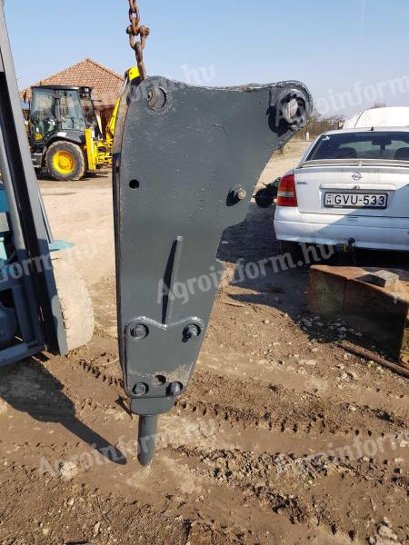 Caterpillar 428.törőfej.