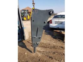 Caterpillar 428.törőfej.