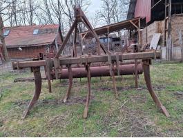 Mélylazító, rögtörő hengerrel