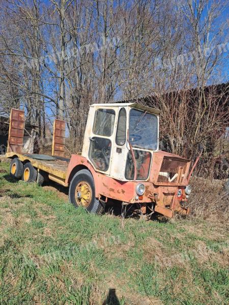 Gép szállító tréler