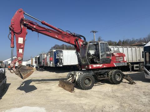 O&amp;K MH6 gumikerekes kotró