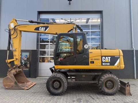 Caterpillar M315D / 2012 / 12 078 üzemóra / Lízing 20%-tól