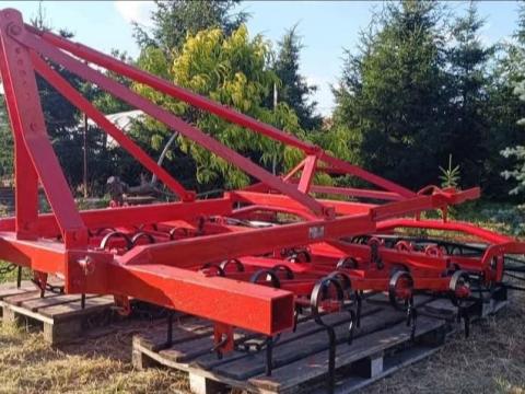 Függesztett rugókapás kombinátor