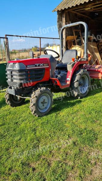 Honda 4x4-es kistraktor gyári talajmarójával eladó