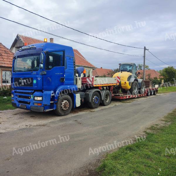 Nehéz gép szállító szerelvény, tréler. ( 18-22t Gumikerekes kotrógépet beszamítunk! )