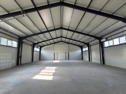 MEGTÉRÜLŐ BEFEKTETÉS IS LEHET ! HOSSZÚ TÁVÚ BÉRLETI SZERZŐDÉSSEL ELADÓ IPARI CSARNOK