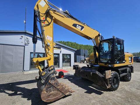 Caterpillar M318D gumikerekes forgókotró Caterpillar M318D gumikerekes forgókotró