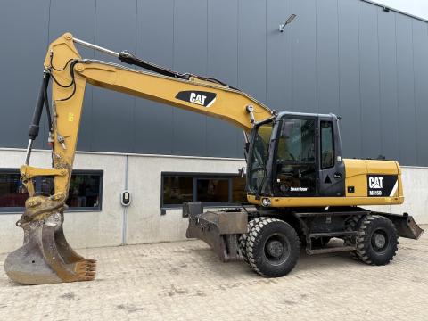 Caterpillar M315D / 2014 / 14 287 üzemóra / Lízing 20%-tól