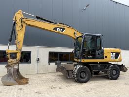 Caterpillar M315D / 2014 / 14 287 üzemóra / Lízing 20%-tól