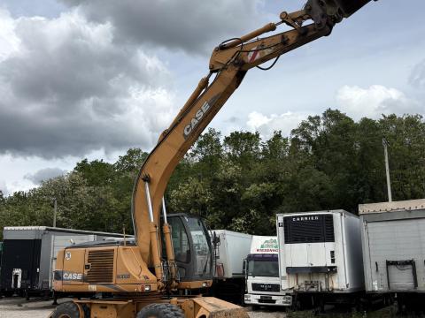 Case WX 185 gumikerekes kotró