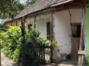 18,9 ha tanya szántóval, legelővel, patak mellett eladó