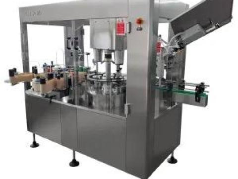 STS 2500 típusú automata boros kapszulázó és öntapadós címkézőgép STS 2500 típusú automata boros kapszulázó és öntapadós címkézőgép