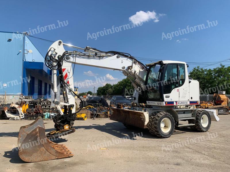 Liebherr A913 Compact + Engcon Rototilt gumikerekes kotró