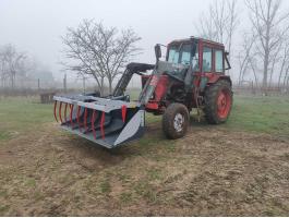 MTZ homlokrakodó