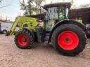 Claas Arion 650 homlokrakodóval