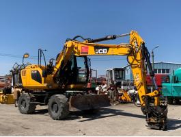 JCB JS145 + Engcon Rototilt gumikerekes kotró