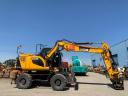 JCB JS145 + Engcon Rototilt gumikerekes kotró