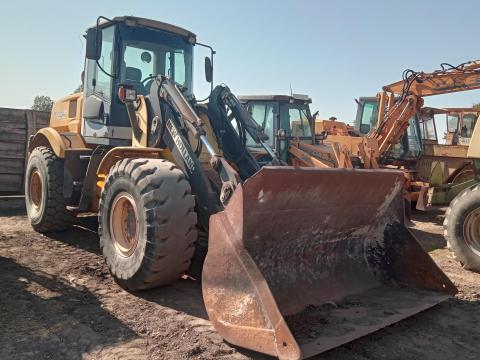 New Holland W170 TC homlokrakodó,  2006-os évjárat