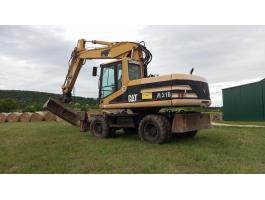 Caterpillar M318 forgókotró