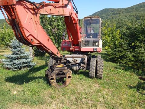Eladó Atlas gumikerekes forgókotró Eladó Atlas gumikerekes forgókotró