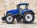 ÚJ New Holland T7.315 Bruder játéktraktor. valósághű funkciók, strapabíró kialakítás ABS műanyagból, 4 éves kortól ajánlott, 1:16 méretarány