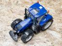 ÚJ New Holland T7.315 Bruder játéktraktor. valósághű funkciók, strapabíró kialakítás ABS műanyagból, 4 éves kortól ajánlott, 1:16 méretarány