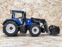 ÚJ New Holland T7.315 homlokrakodós Bruder játék traktor. valósághű funkciók,strapabíró kialakítás ABS műanyagból, 4 éves kortól ajánlott, 1:16 méretarány