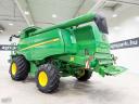 John Deere T670i (665/1181 üzemóra) 6 ládás, 9,15 m 630X Vario vágóasztal, szállítókocsi, repcekaszák, full AutoTrac, doblassító, kukorica készlet, ProDrive, 900/60R32